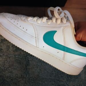 White Sneakers with Teal Swoosh
